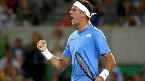 RIO DE JANEIRO, BRAZIL - AUGUST 07: Juan Martin Del Potro reacts after winning a point against Novak Djokovic of Serbia in their singles match on Day 2 of the Rio 2016 Olympic Games at the Olympic Tennis Centre on August 7, 2016 in Rio de Janeiro, Brazil. (Photo by Clive Brunskill/Getty Images)